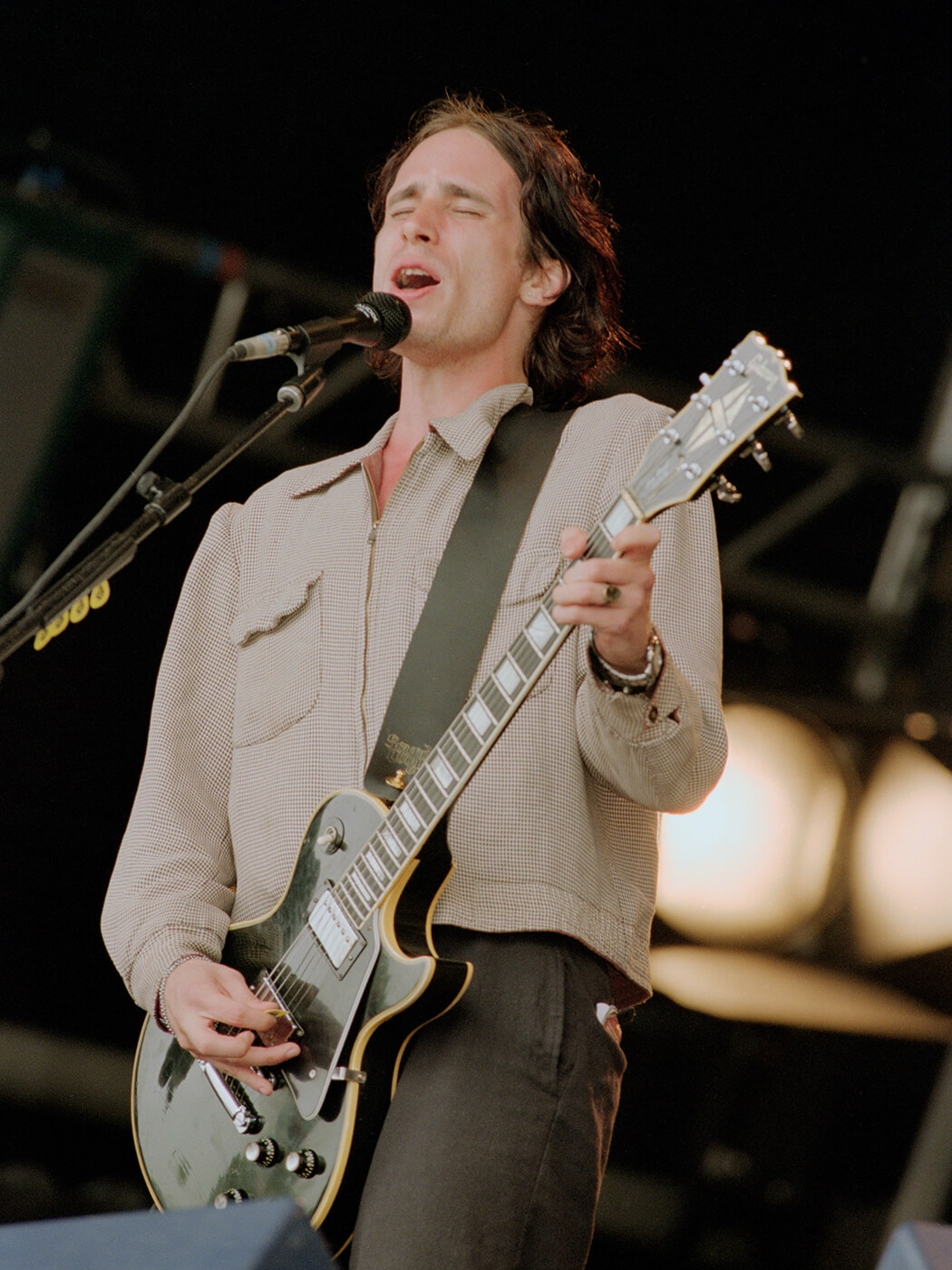 Jeff Buckley performing at Glastonbury in 1995, photo by Brian Rasic/Getty Images